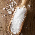 sea salt in wooden scoop