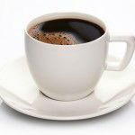 Coffee cup and saucer on a white background.