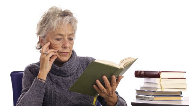older woman reading
