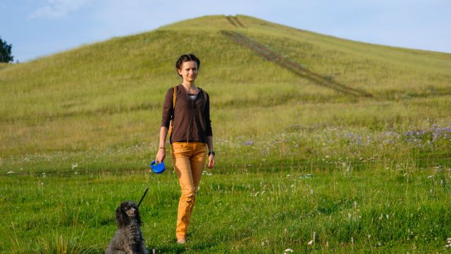 Girl walking with a dog