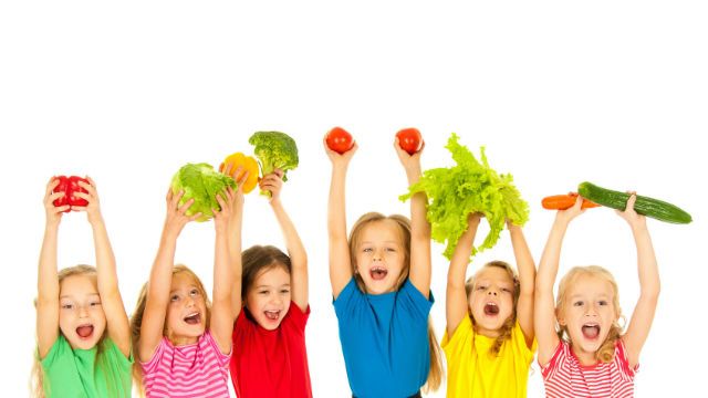 Children with vegetables