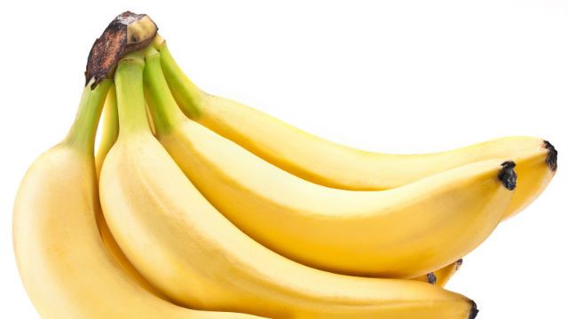 Banana fruits on over white.