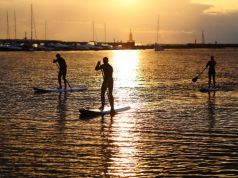 Pilates and Stand-Up Paddleboarding Fuse to Create a Whole New Workout
