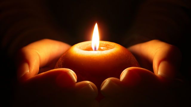 candle in hands