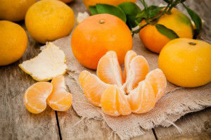 fresh organic tangerines and peeled slices