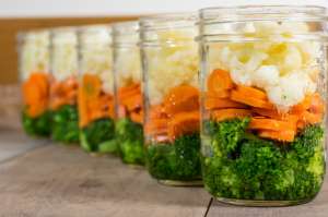 Jars of cut vegetables for canning