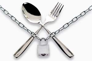 "Fork and spoon armored chain and padlock"