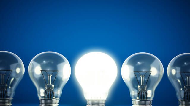 One lit bulb among unlit ones