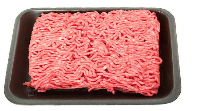 A tray of fresh lean ground beef from supermarket isolated on white background