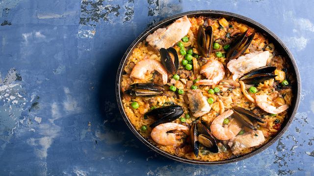 Traditional seafood paella in the pan