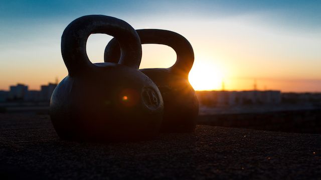 Pair of sports pood-weight kettlebells