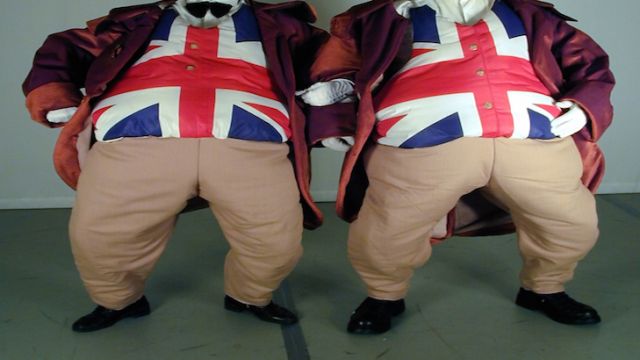 two obese people wearing union jack waistcoats