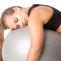 Woman Falling Asleep in the Gym