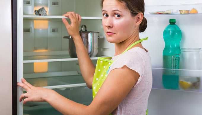 This Gross Stuff Is Lurking Behind Your Stove And Refrigerator