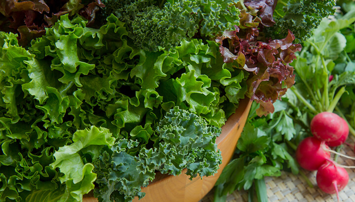 Getting plenty of iron in leafy greens can help prevent hair loss.