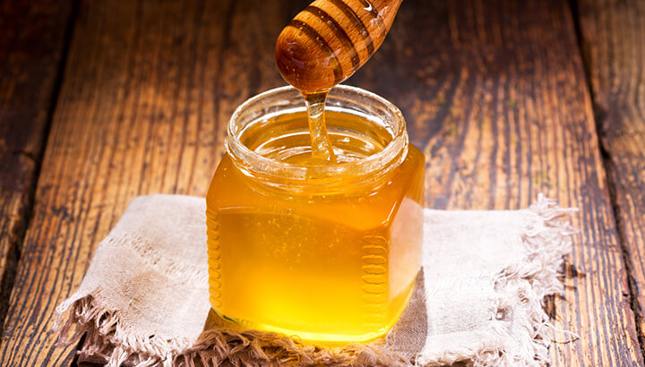 Adding raw honey to water can help you fight infections, boost immunity and more.
