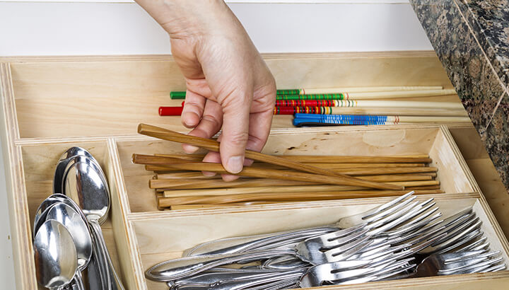 Declutter your kitchen by going one through one drawer at a time.