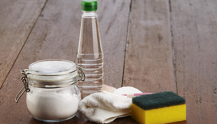 White vinegar and baking soda will keep your pans clean.