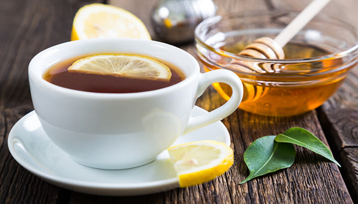 If you feel under the weather from swine flu, drink tea with lemon and honey.