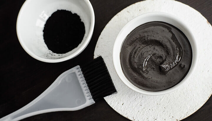 Make an activated charcoal mask to clean out skin impurities.