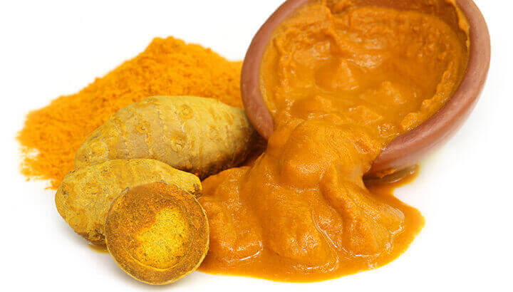 Make turmeric paste by mixing turmeric, water and pepper.