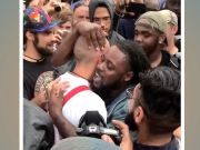 Protestor Hugs CONTROVERSIAL Person He Is Protesting (Watch What Happens Next)
