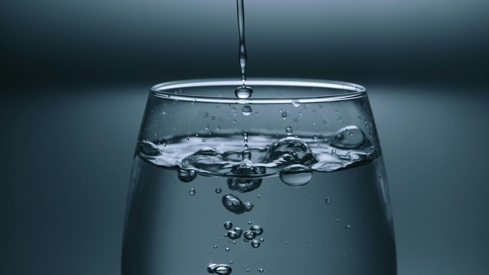 glass of water suggesting steady hydration